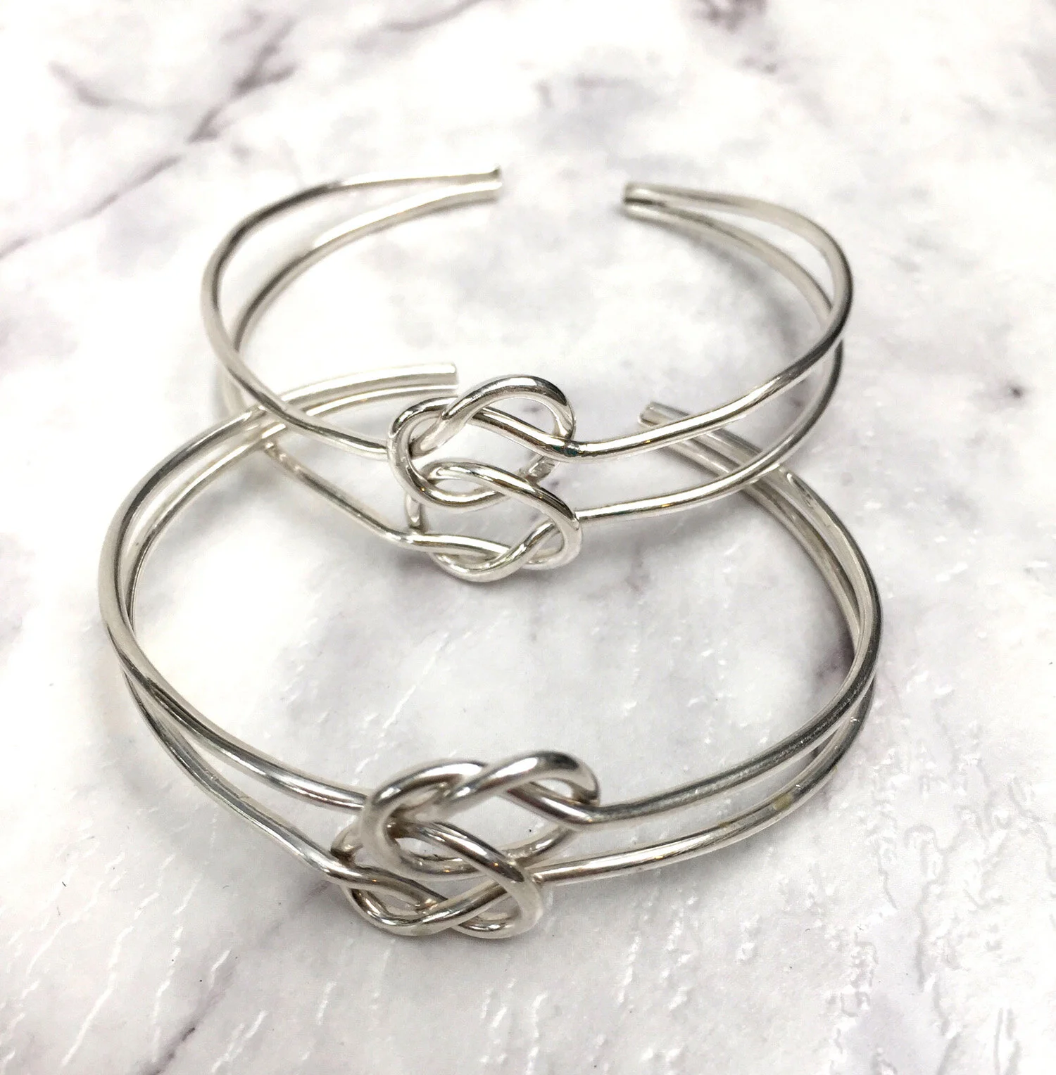 silver-goose-silver-knot-bracelets.jpg