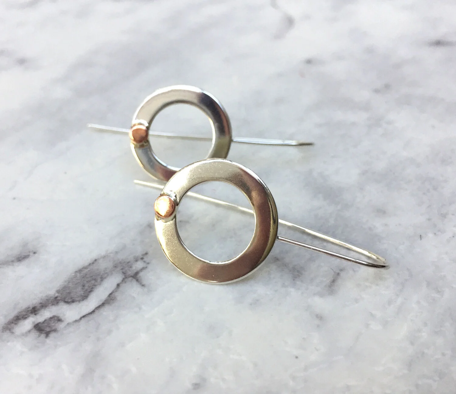 silver-goose-circle-of-life-earrings.jpg