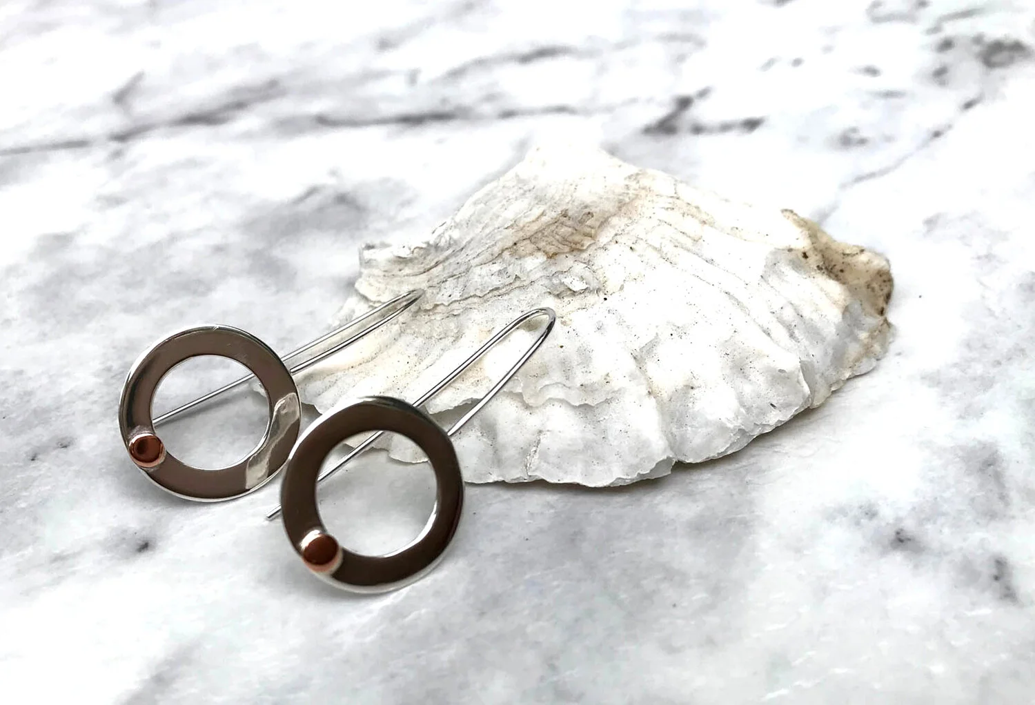 silver-goose-circle-of-life-earring.jpg