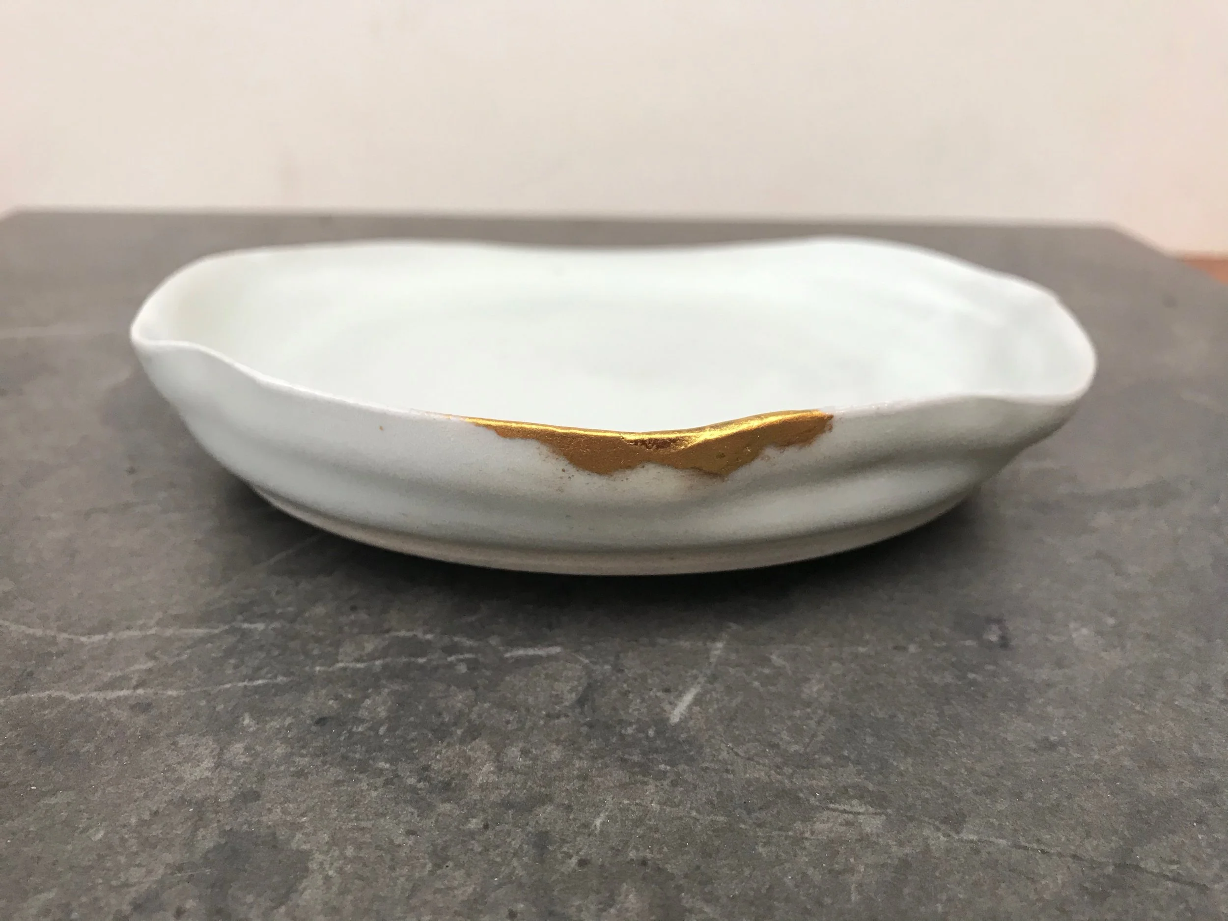 kintsugi repair plate.jpeg