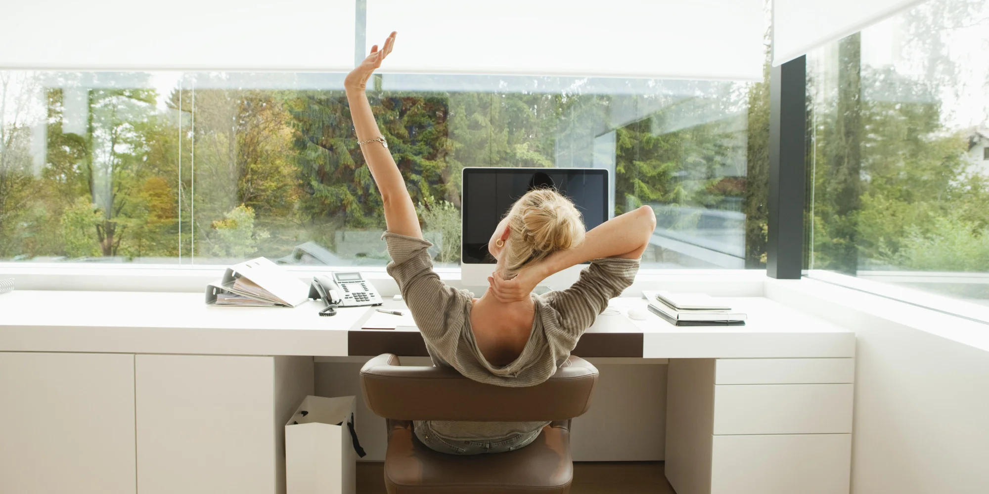 Woman with back pain at computer.jpg.838x0_q67_crop-smart.jpg