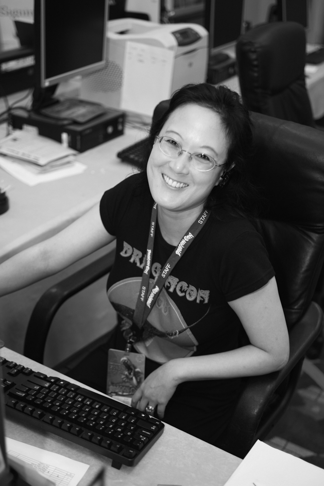 Eugie Foster working on the Daily Dragon at Dragon Con.