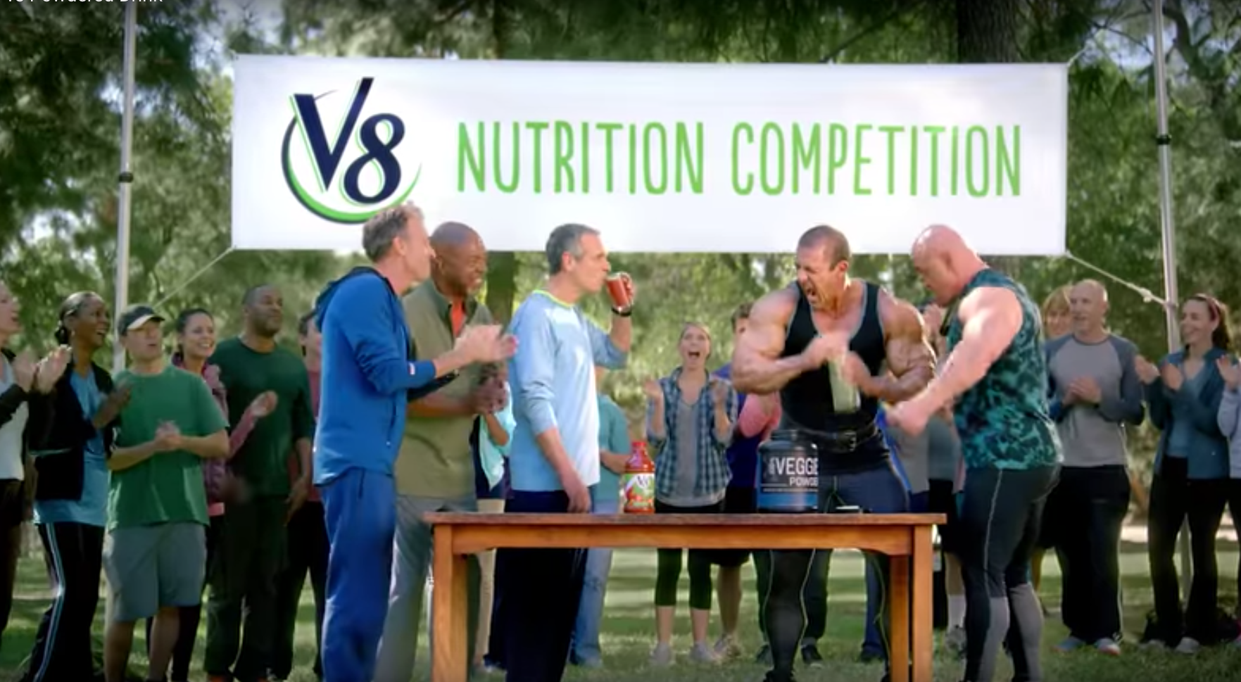 In the men's version of the spot, a trim Baby Boomer beats two cartoonish bodybuilders.