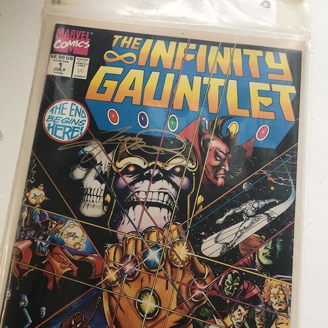 After acting like I should be looking for this for a few months I finally found it. Infinity Gauntlet #1. Can anyone tell me if this is worth having graded (and how that works?). And do you know who this signature is? 
#marvelcomics #thanos #infinity