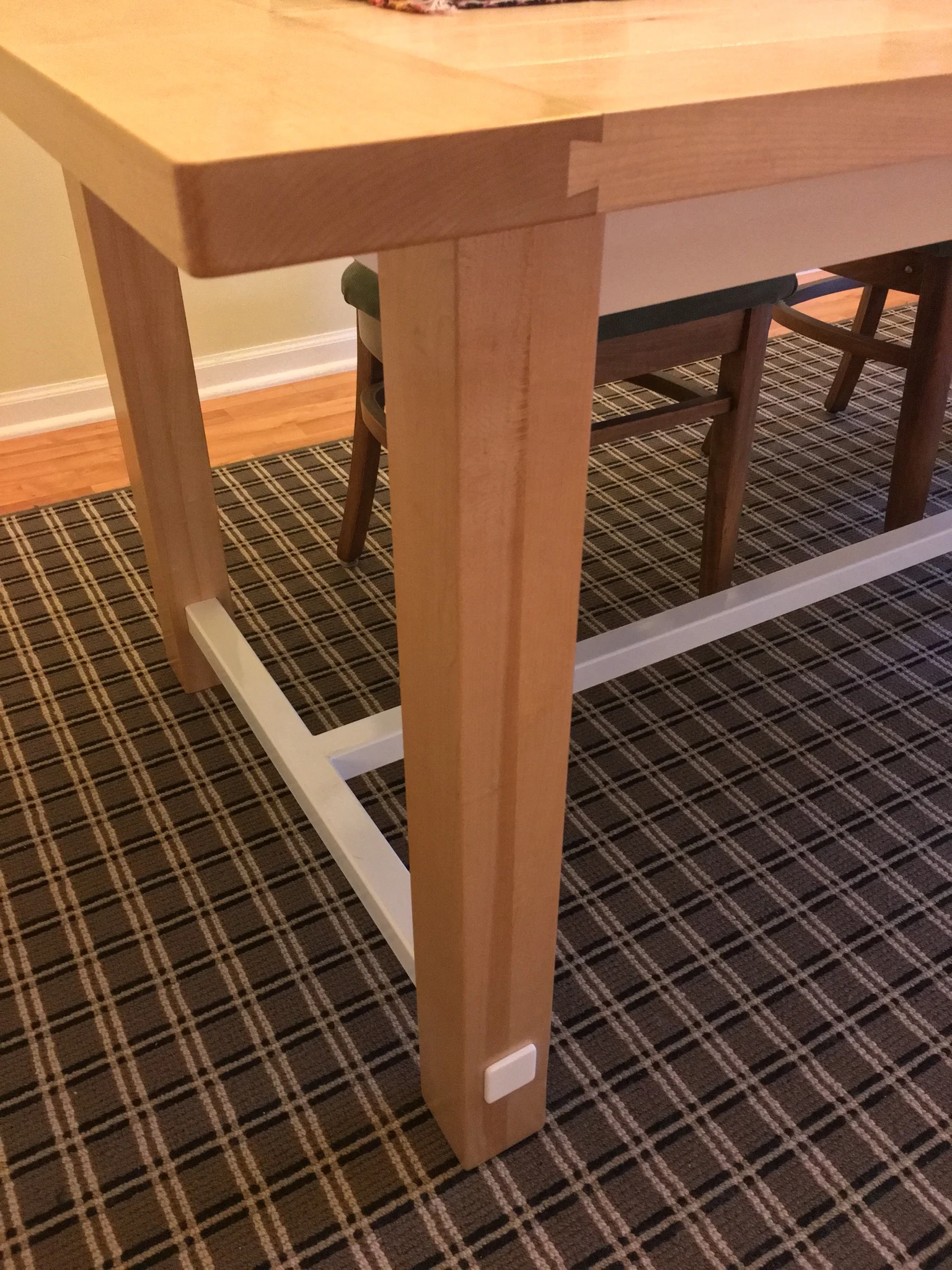 Details: Dovetailed bread board ends, and the through-tenon effect on the stretcher.