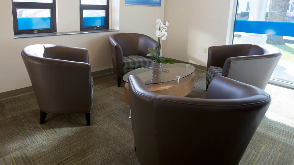 Interior view of conference room, materials and furniture specified by Caleigh Pollard.