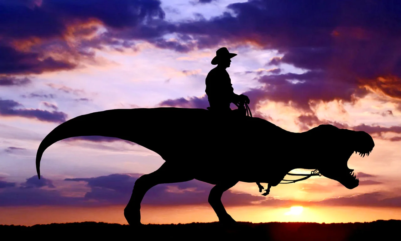 free-cowboy-riding-dinosaur_104316.jpg