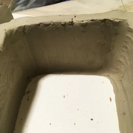 Smoothed walls to hold the plaster around the "brick"