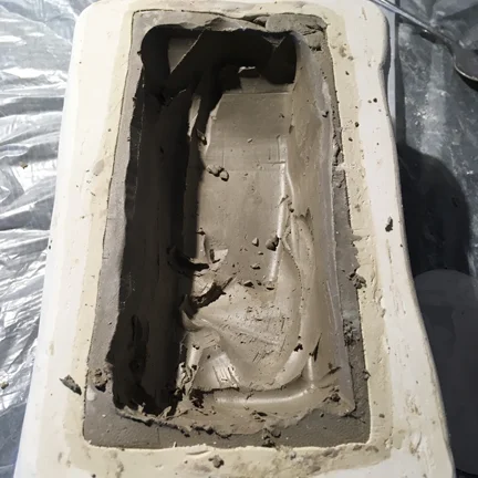the original being removed from the mold