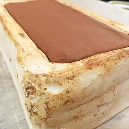 wire off clay to get a flat surface