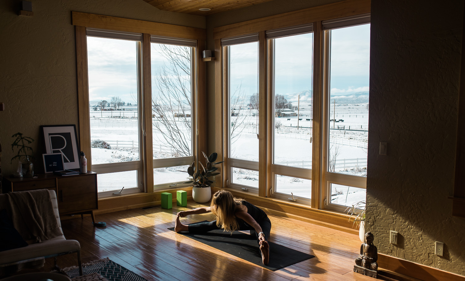 This is my least favorite pose. I’m sitting on a small block to help me tilt my pelvis forward. Also, it snowed.