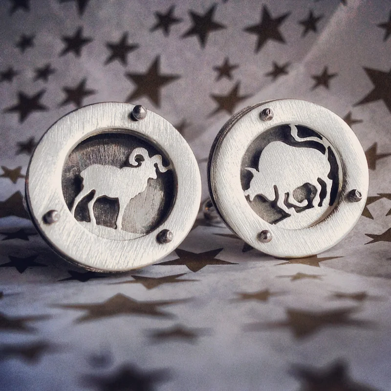 Cuff links with Aries and Taurus for a collector with cusp zodiac sign.