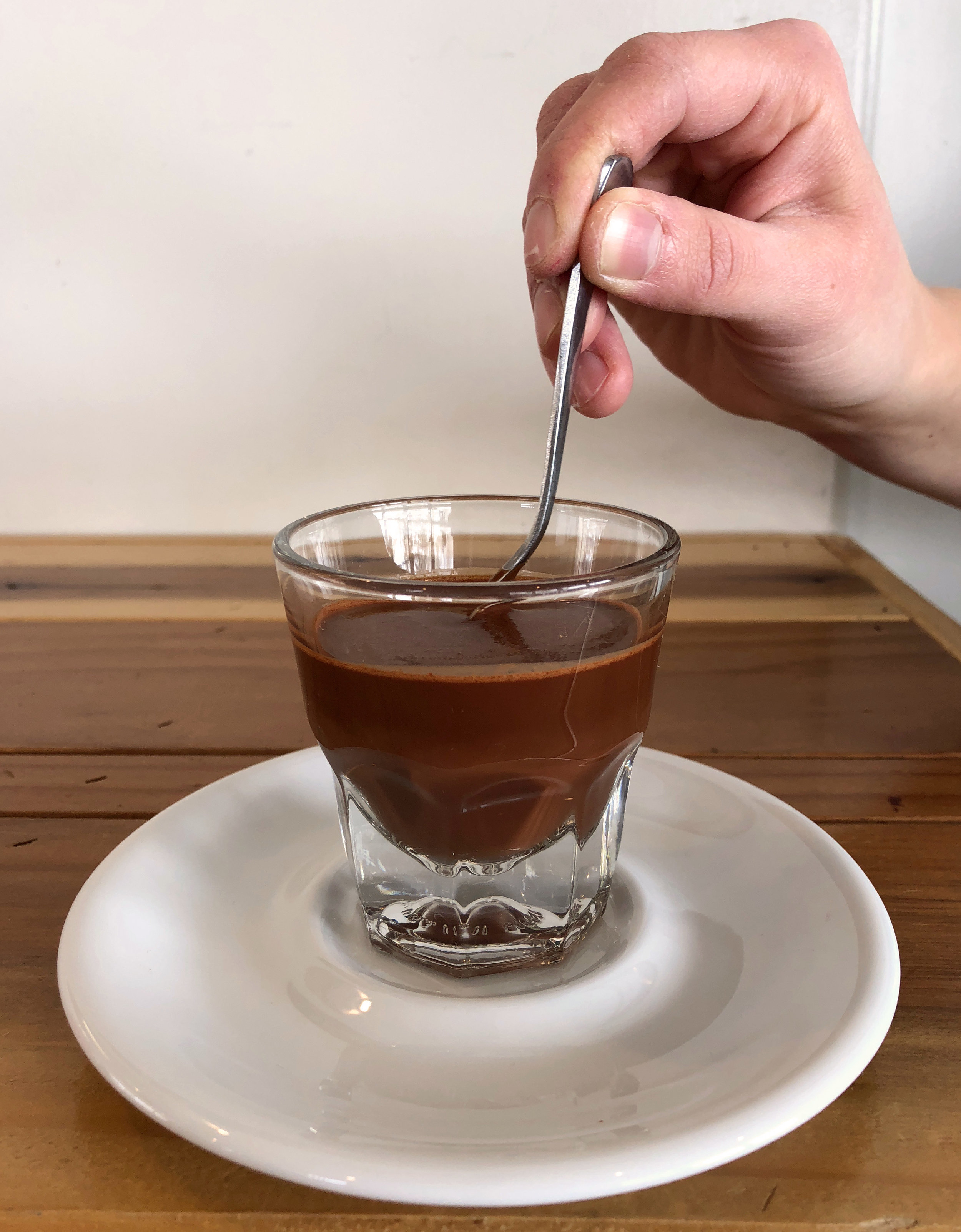 "Sipping Chocolate" is a delicious way to drink pure chocolate. The recipe is basically equal parts (by weight) ground chocolate to boiling water.