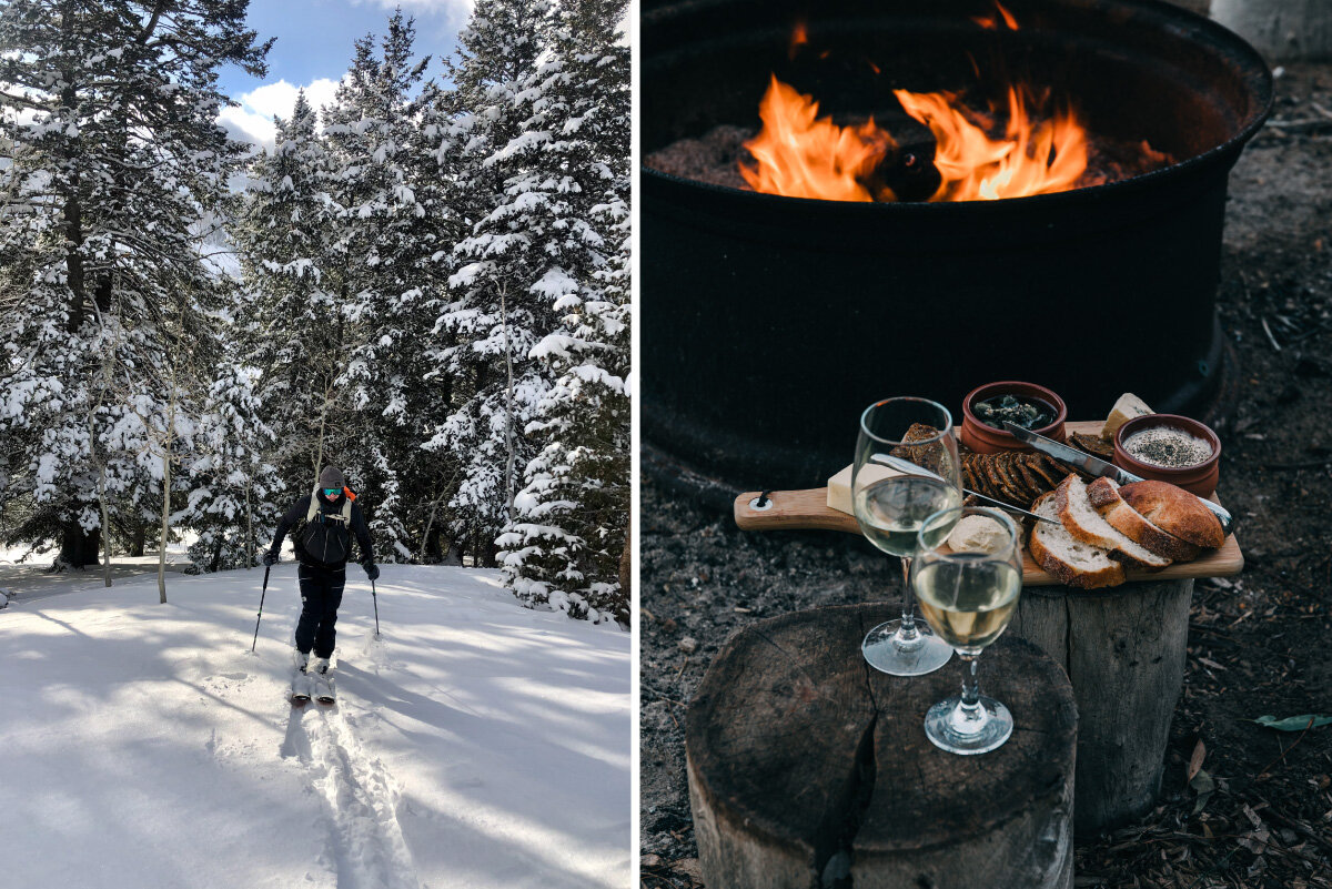 Two skiers skin up a low grade snowy hill, a setting sun peaks from behind a coniferous tree. Another photo of a fire pit, surrounded by log stumps with glasses of white wine and a charcuterie board.