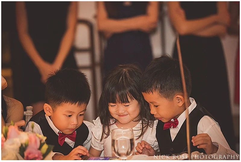 Children playing at a wedding in Asia