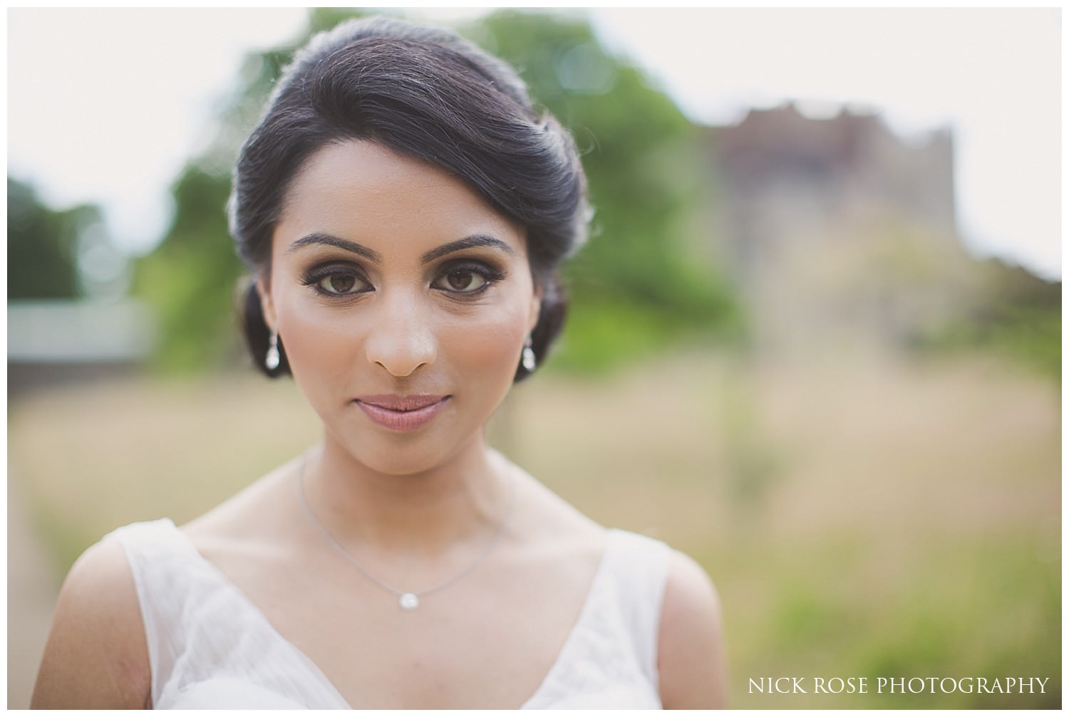  Bride looking at the camera before a Kent wedding at Hever Castle 