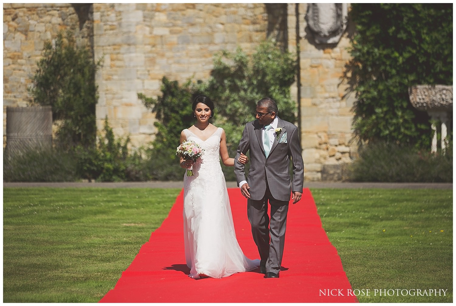  Father of the bride walking daughter up the aisle at hever castle&nbsp; 