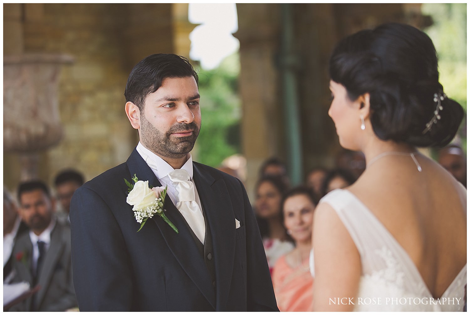  Bride and groom saying wedding vows at Wedding ceremony at Hever Castle 