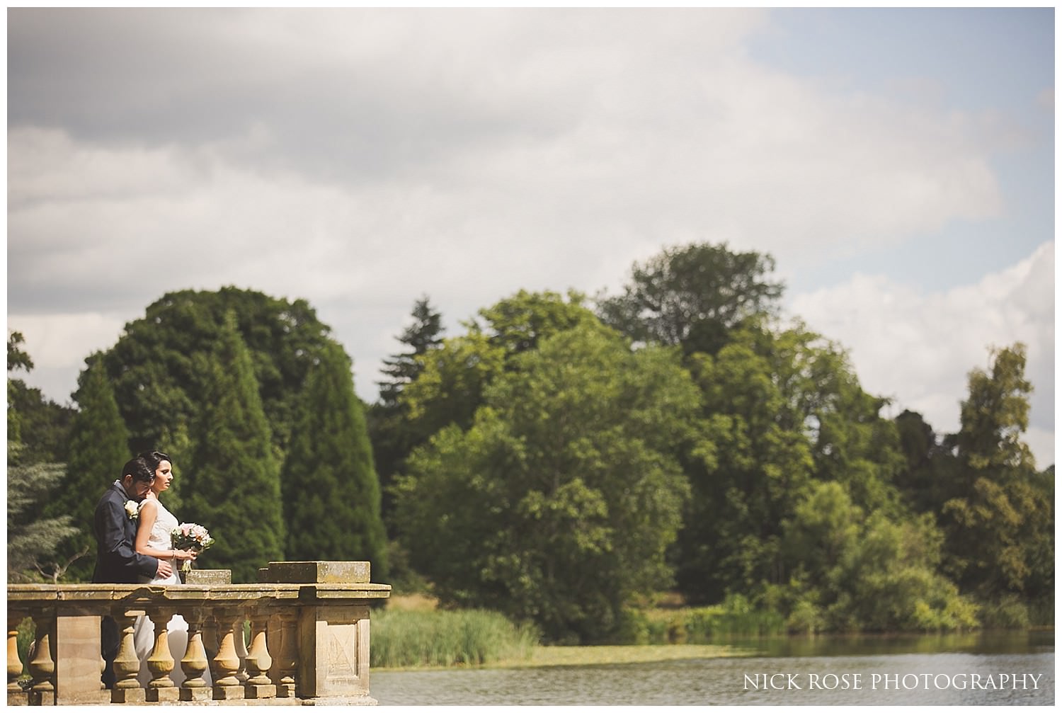  Lakeside wedding portrait photograph by the lake at Hever Castle in Kent 