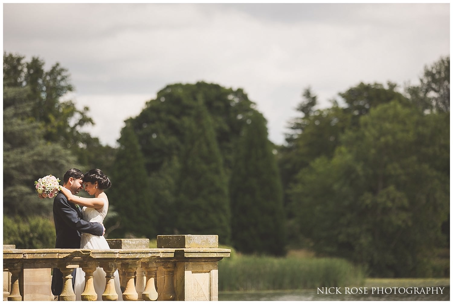  Wedding portrait photograph at the lake in Hever Castle Kent 