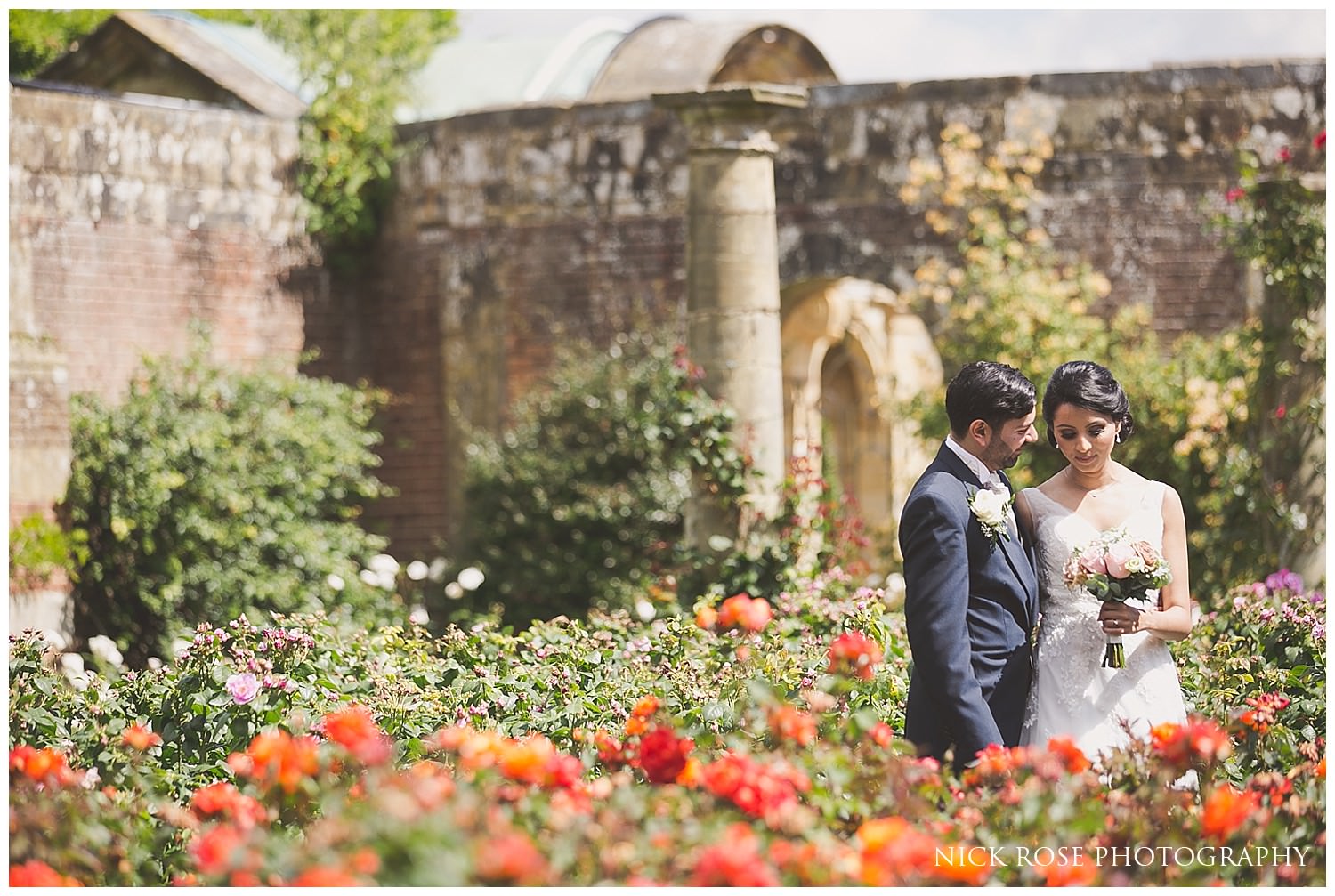  Bride and groom wedding photography portrait in the gardens at Hever Castle Kent 