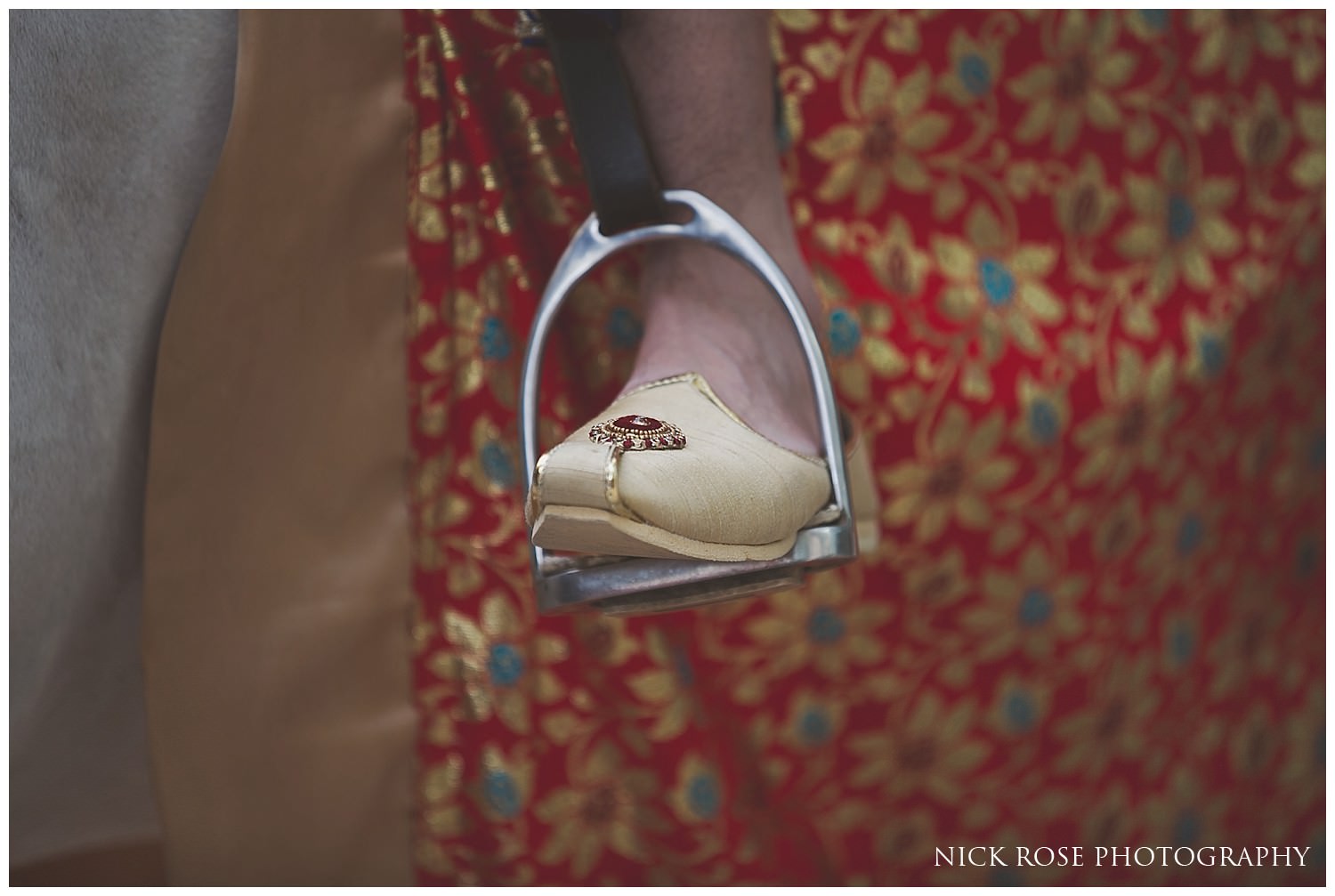  Hindu wedding shoe inside a stirrup before an Indian wedding in London 