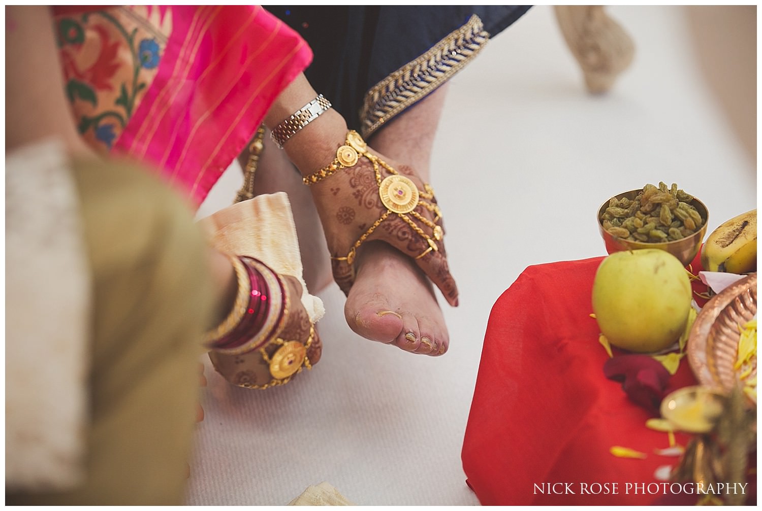  Indian groom having his feet washed before a Hindu wedding in London 