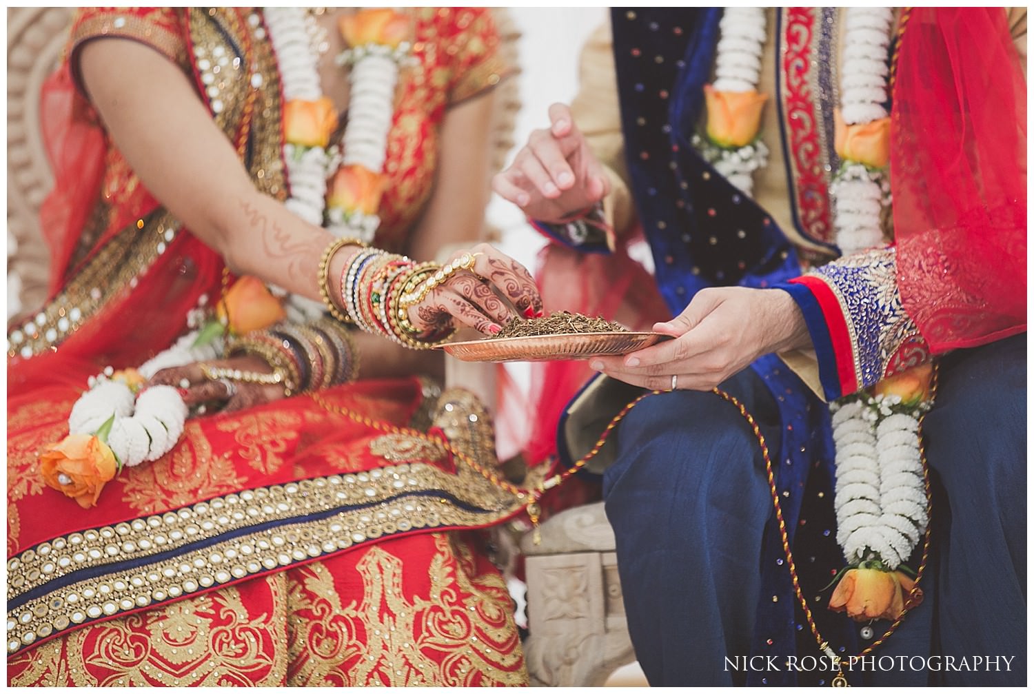  Asian Hindu wedding rituals taking place in the East Wintergarden at London's Canary Wharf 