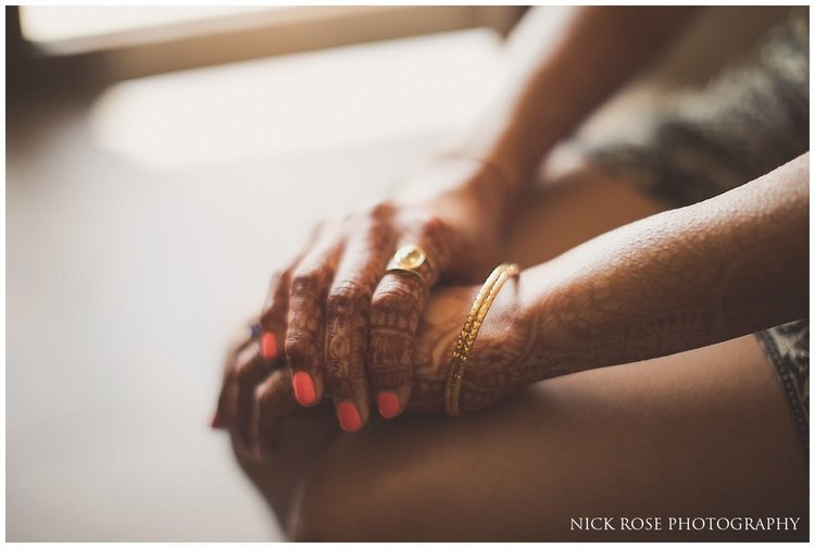 Bride sitting with her hands on her lap getting ready for a Hindu wedding in Dubai