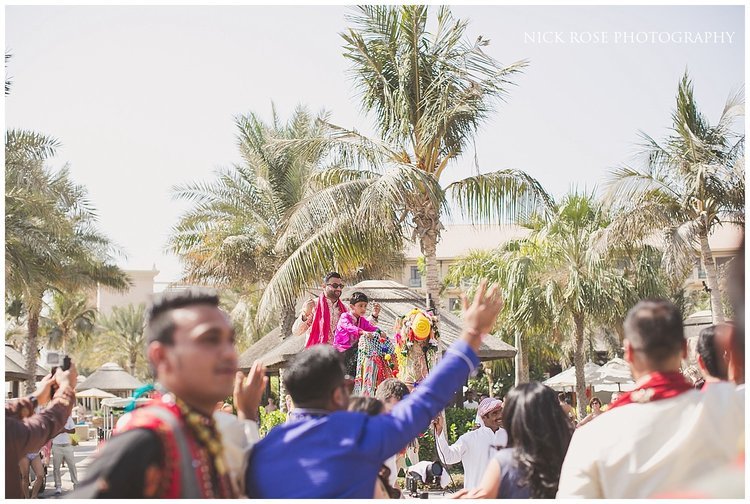 Guests dancing at an Asian destination wedding Barrat in Dubai