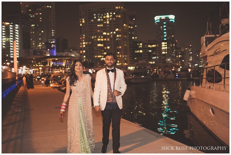 Bride and groom arriving for a private yacht wedding reception at Dubai marina