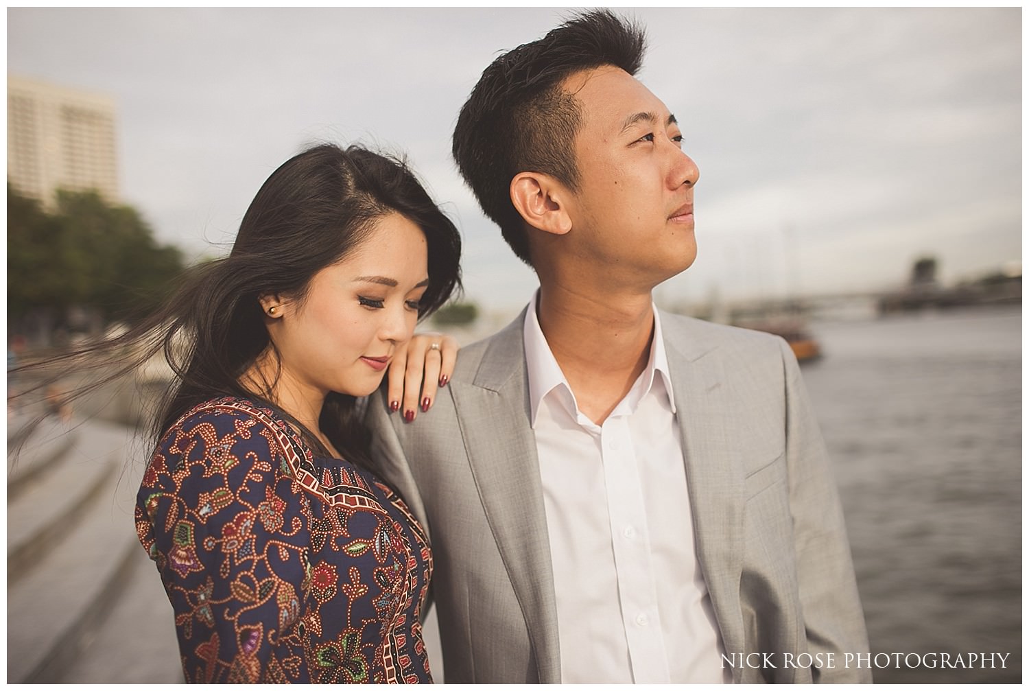  Pre wedding photography couple standing by the water at Marina Bay in Singapore 