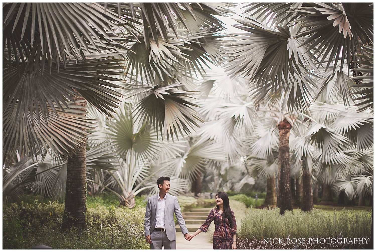  Couple holding hands at the Gardens By the Bay for a Singapore pre wedding photography shoot 