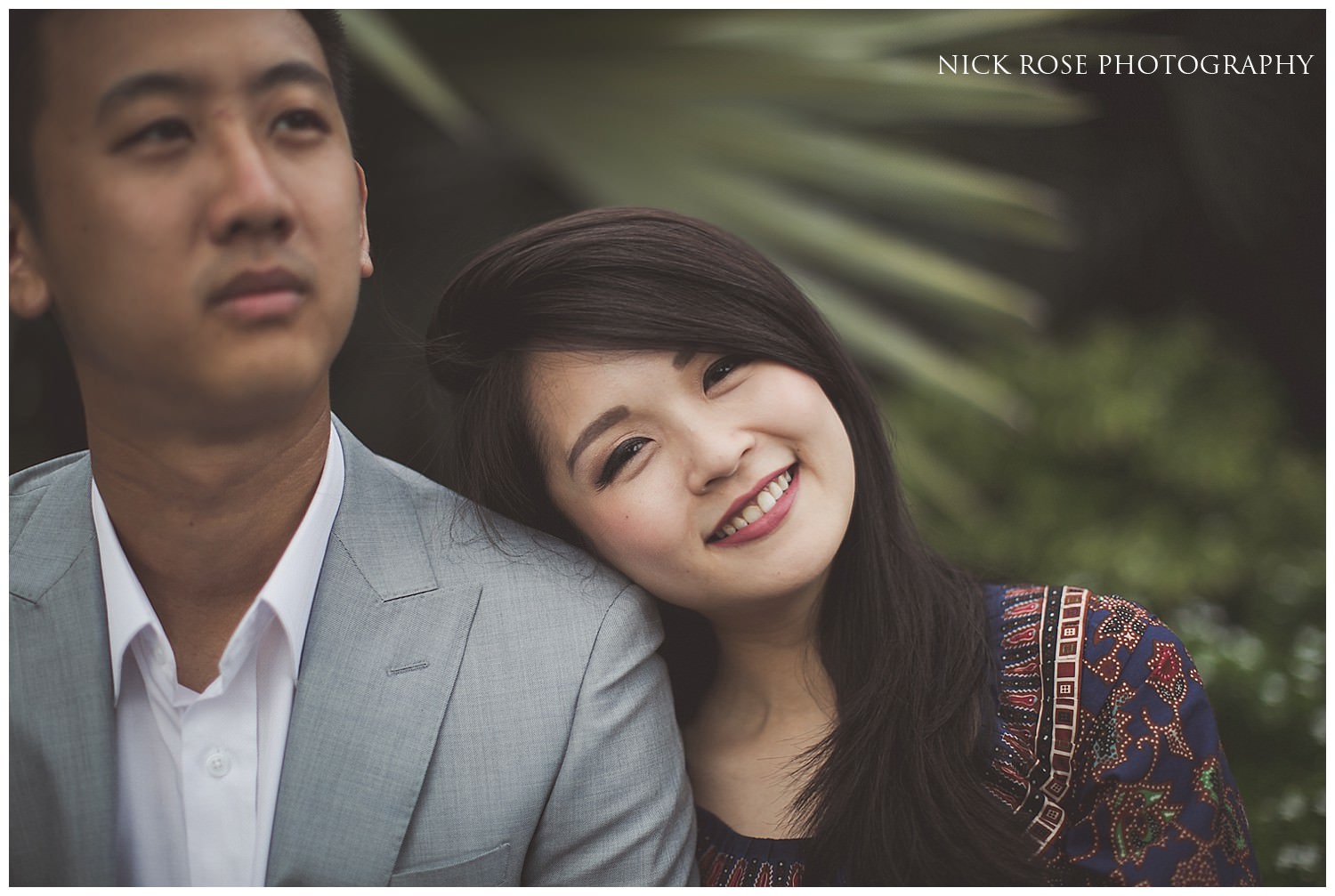  Girl resting her head on her fiance's shoulder during a Singapore pre wedding shoot 