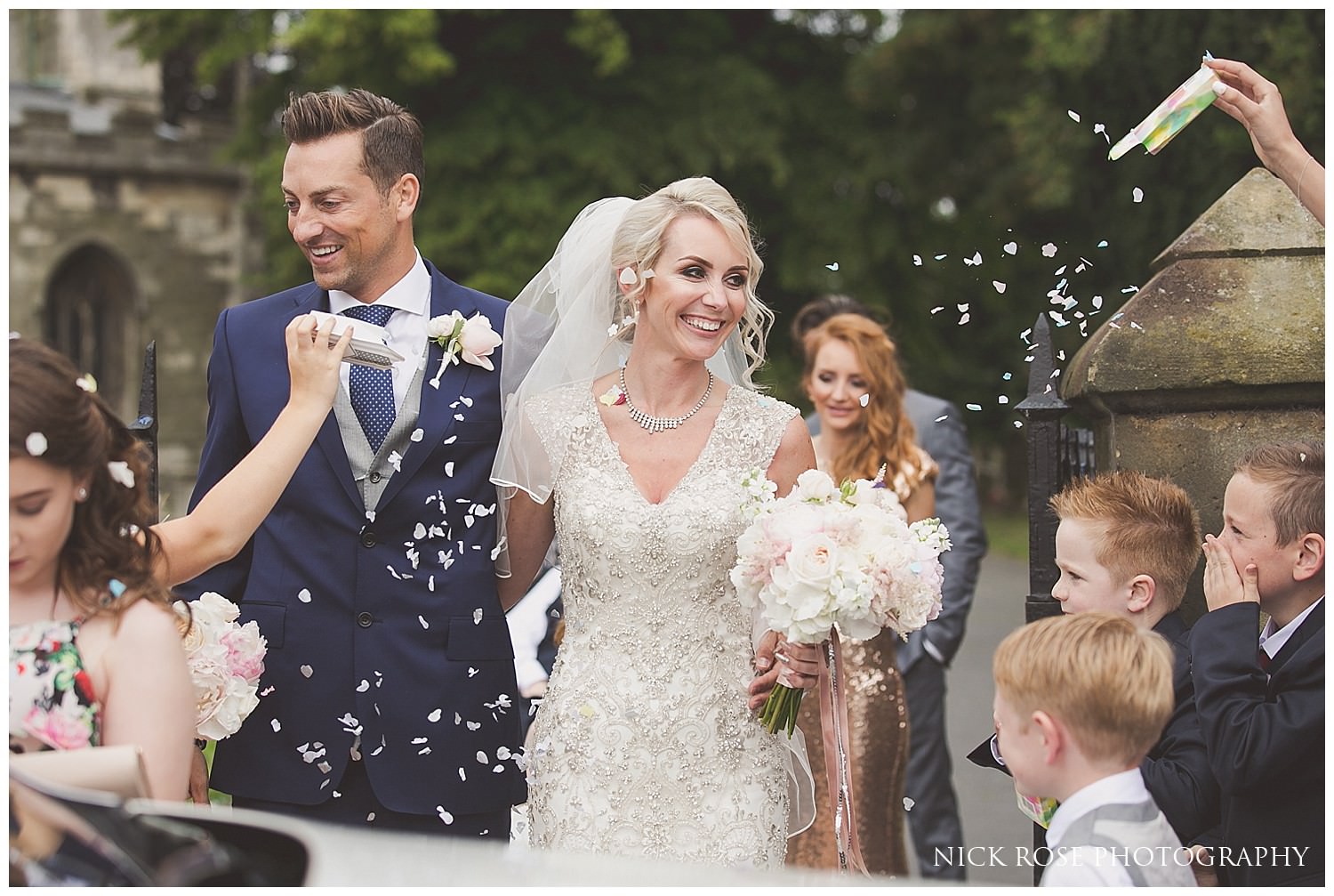  Wedding ceremony confetti throw outside St Mary's in Tickhill 