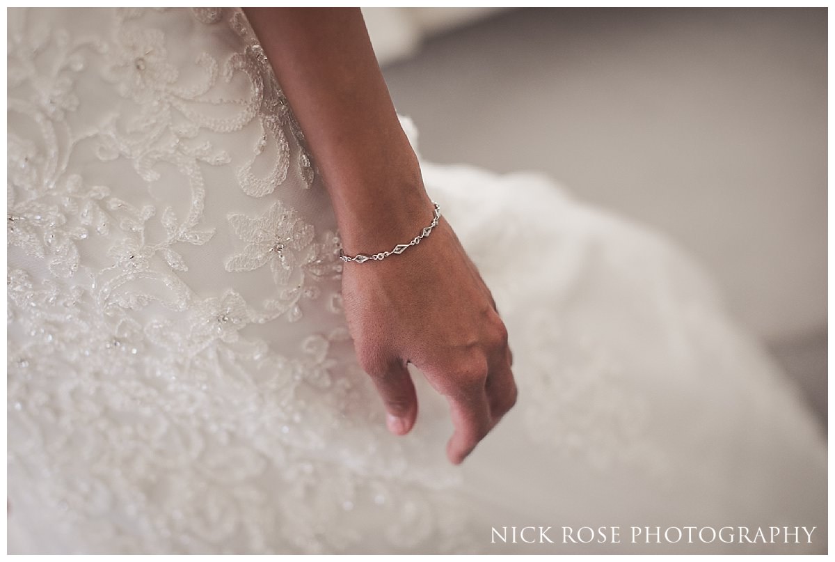  Bride's bracelet and wedding dress for a fairytale wedding at Hedsor House in Buckinghamshire 