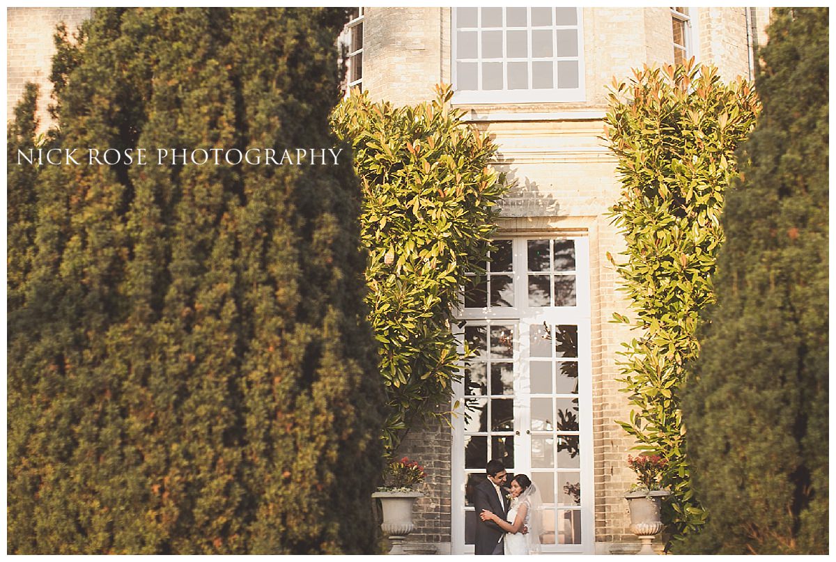  Couple wedding portrait in front of Hedsor House in Buckinghamshire 