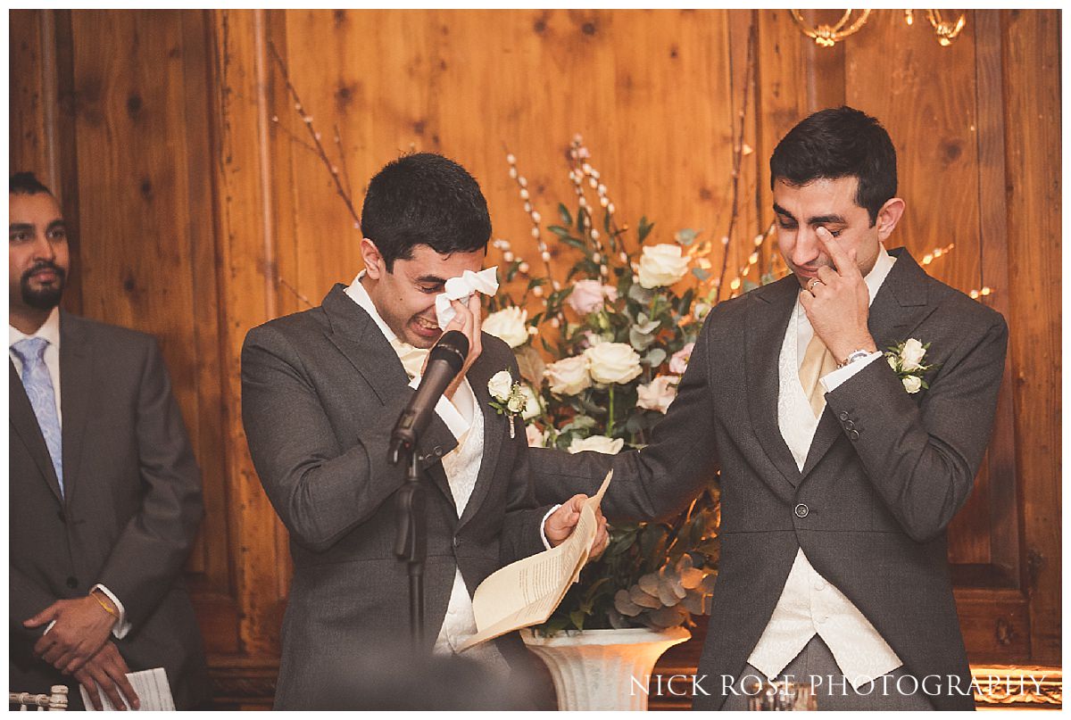  Emotional groom and best man during the wedding speeches at Hedsor House 
