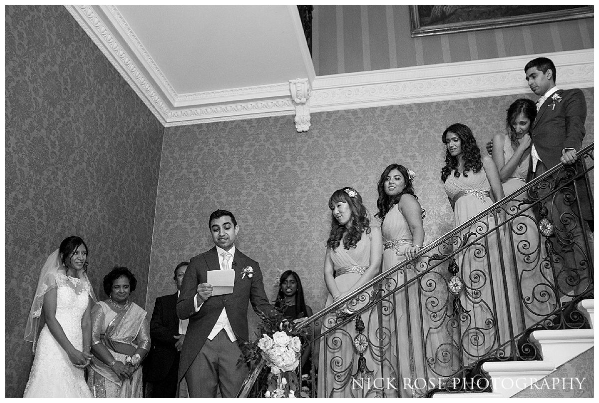  Speeches on the main staircase for a Hedsor House wedding reception in Buckinghamshire 
