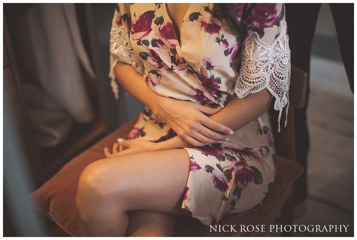  Bride getting ready before her Knightsbridge wedding in London 