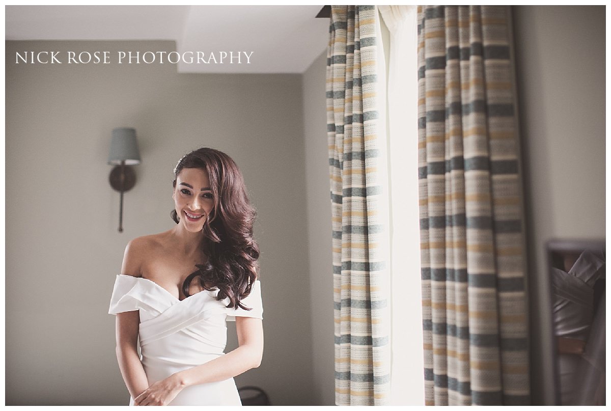 Beautiful bride getting ready before her wedding at the Shoreditch House Hotel in London 