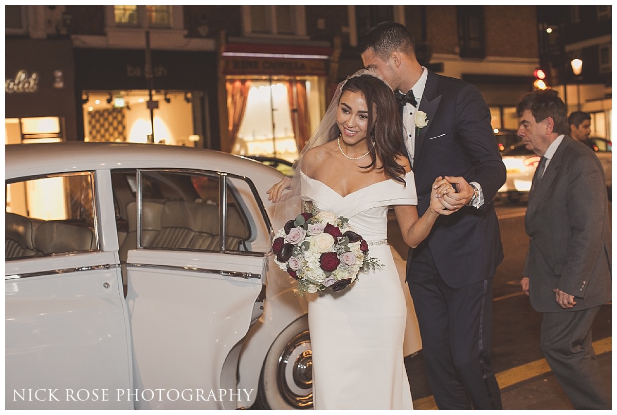  Bride and groom arriving for their Restaurant-Ours Wedding reception in Knightsbridge London 