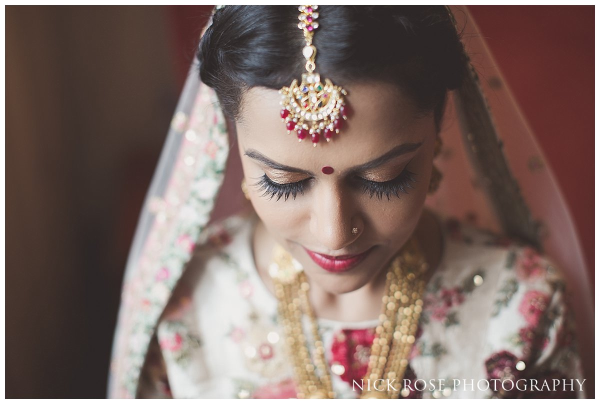  Beautiful Hindu bride before her Hindu wedding ceremony at The Grove in Hertfordshire 
