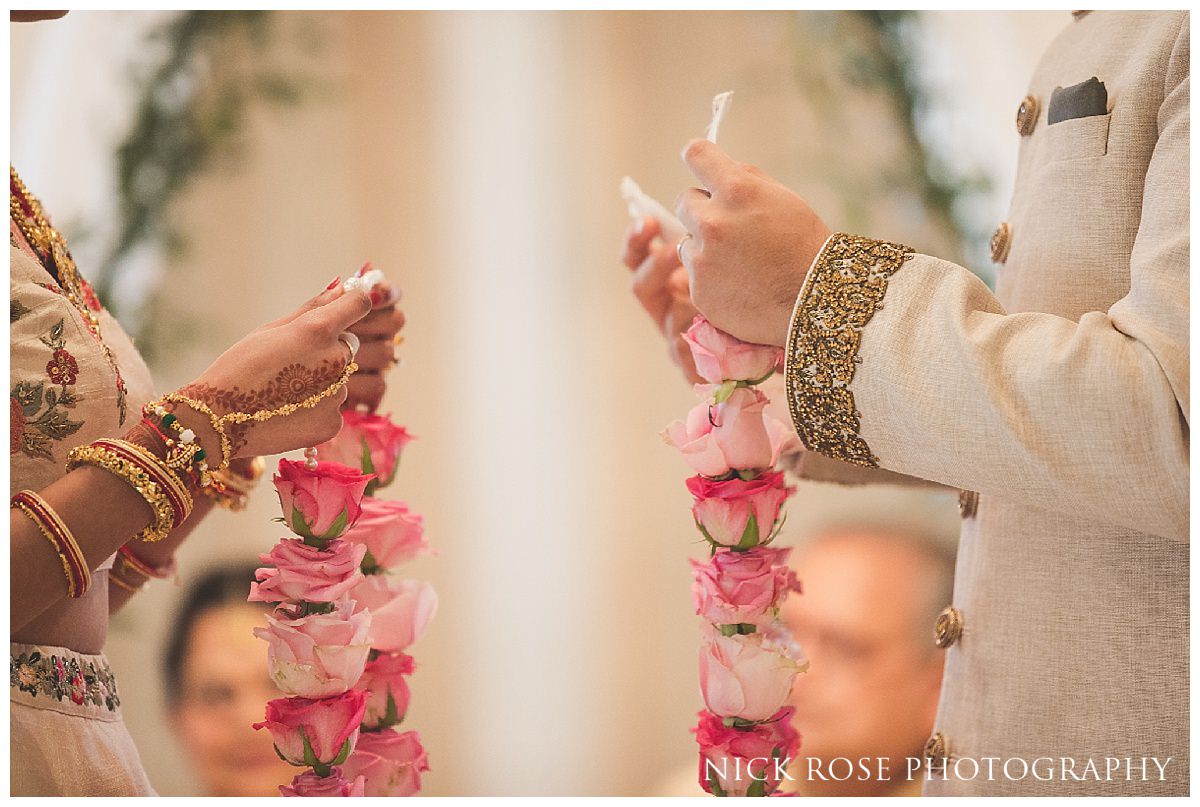  Exchange of garlands during a Hindu wedding service at The Grove 