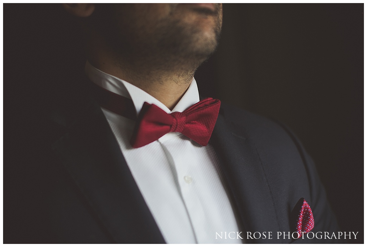  Groom getting ready for a Hindu reception at The Grove in Hertfordshire 