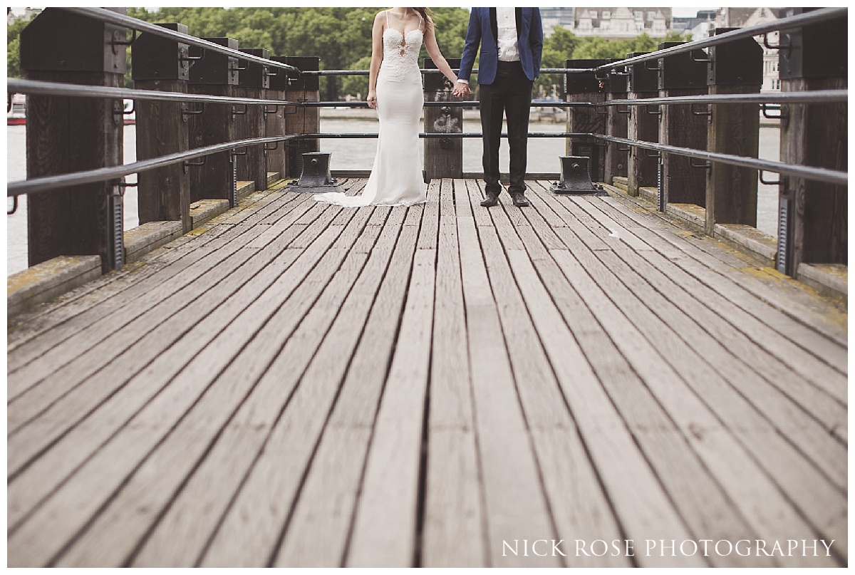  Pre wedding photography portrait on a jetty at London's Southbank along the River Thames 