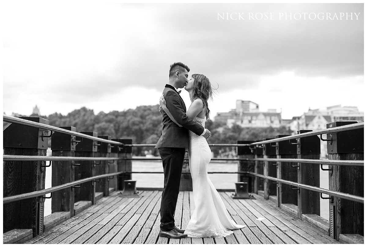 Engagement photography portrait on a jetty at London's Southbank along the River Thames