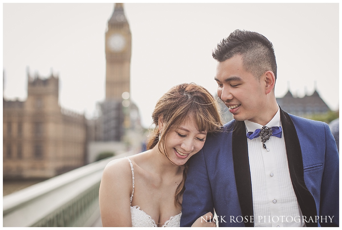  Couple walking over Westminster Bridge during a pre wedding photography shoot in London 