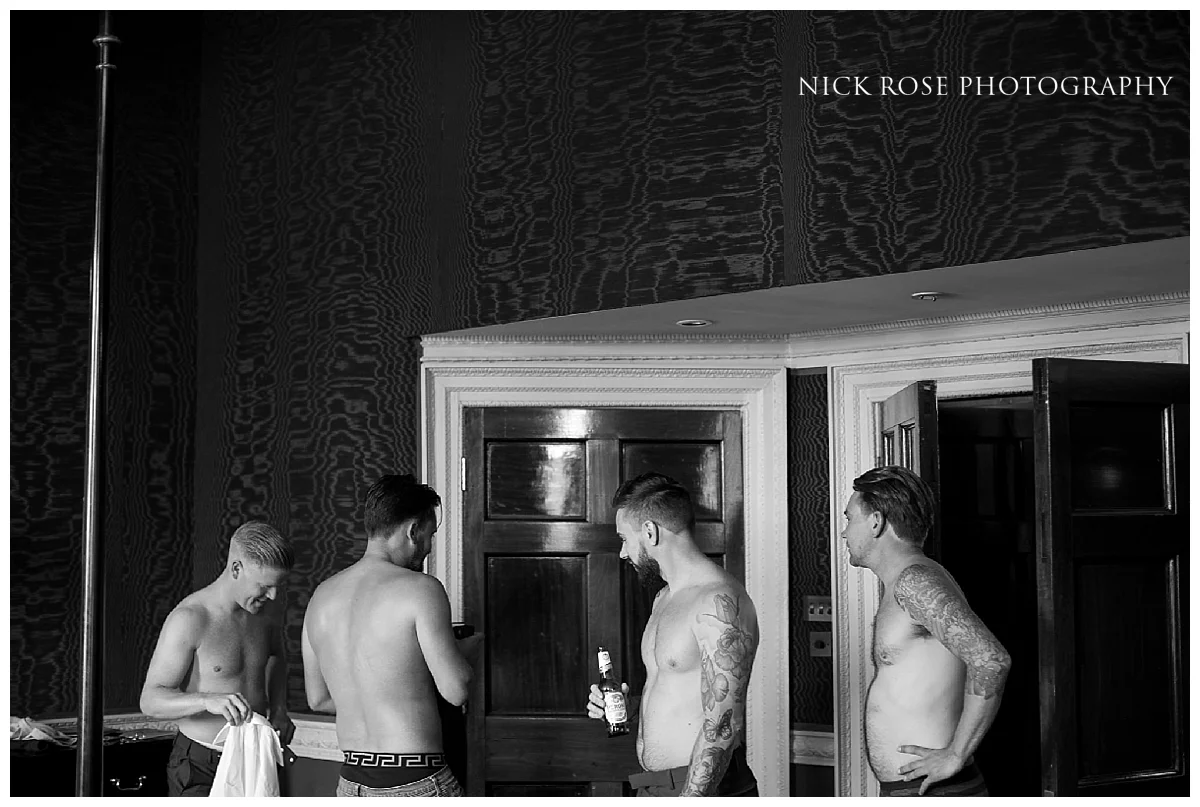 Groom preparation for a Buxted Park hotel wedding in East Sussex