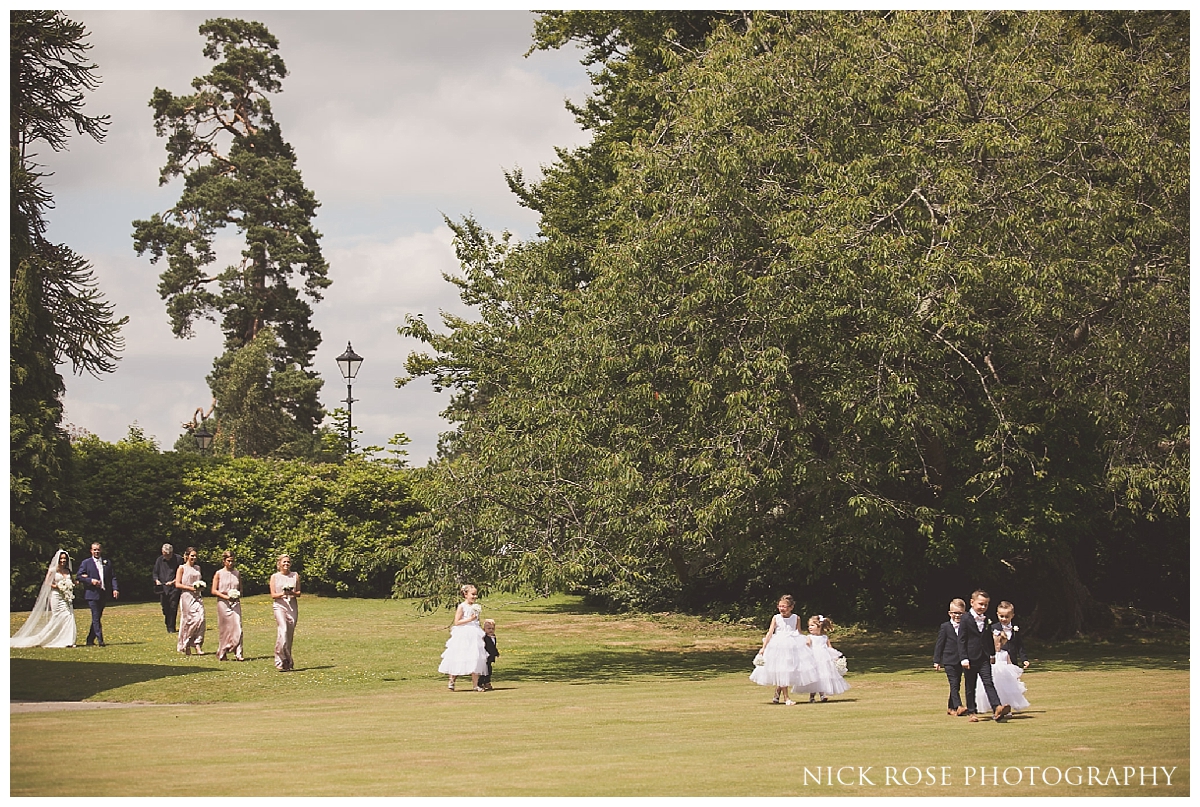  Outdoor wedding ceremony at Buxted Park in East Sussex 